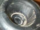 seat for the piston stud in lower diaphragma