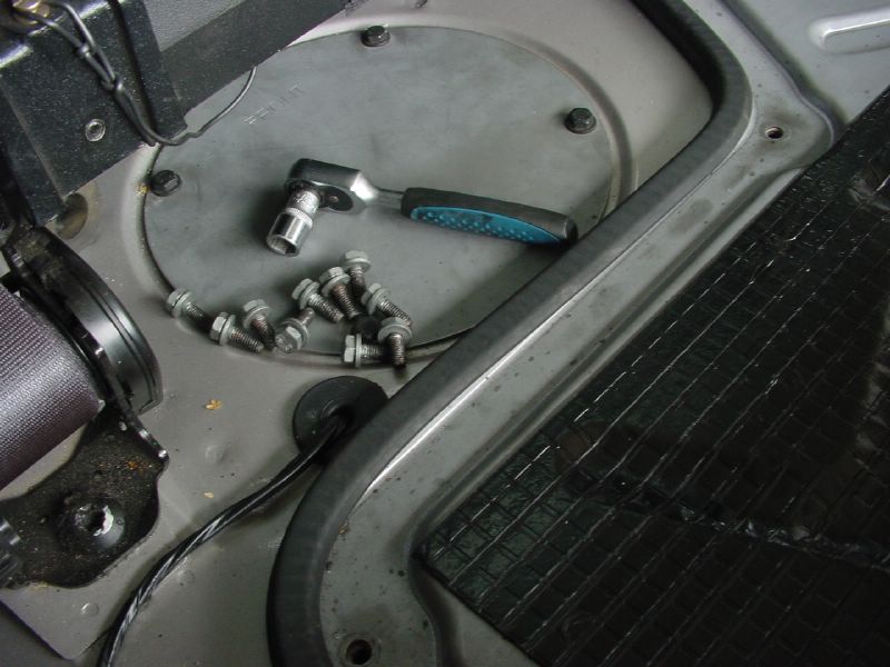 unbolt engine cover